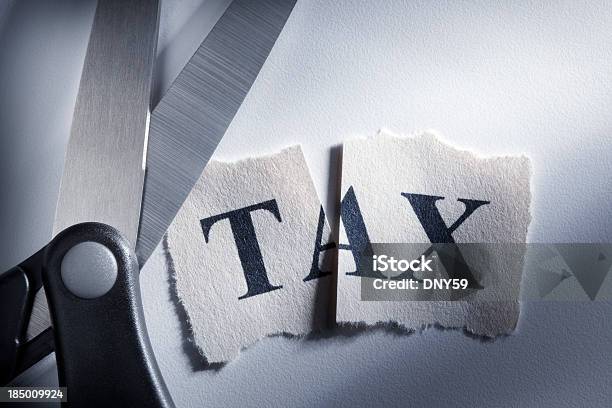 Tax Cut Stock Photo - Download Image Now - Tax, Cutting, Cross Section