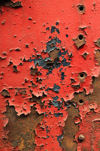 istock Peeling red paint on rusted metal 185010804