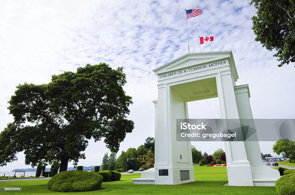 Peace Arch Park at United States and Canada border "Peace Arch Park at United States and Canada border between the communities of Blaine, Washington and Surrey, British Columbia. Other images of the Peace Arch:" Geographical Border Stock Photo