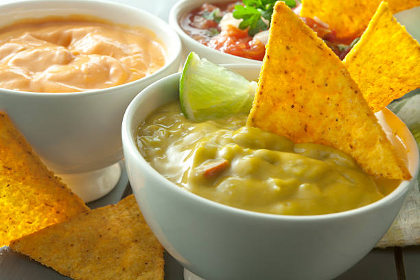 istock TexMex Food: Guacamole, Cheese Dip, Salsa and Nachos 185011453