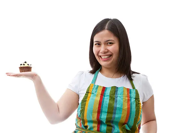 Photo of Chef with her choc-chip cup cake