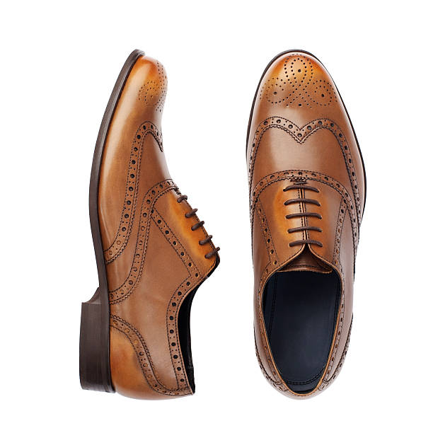 Shoes... A pair of classic brown shoesaA|Other shoes in this series... shoe stock pictures, royalty-free photos & images