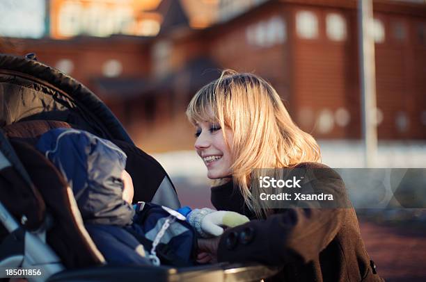 Mother And Baby Stock Photo - Download Image Now - Baby Carriage, Winter, Mother