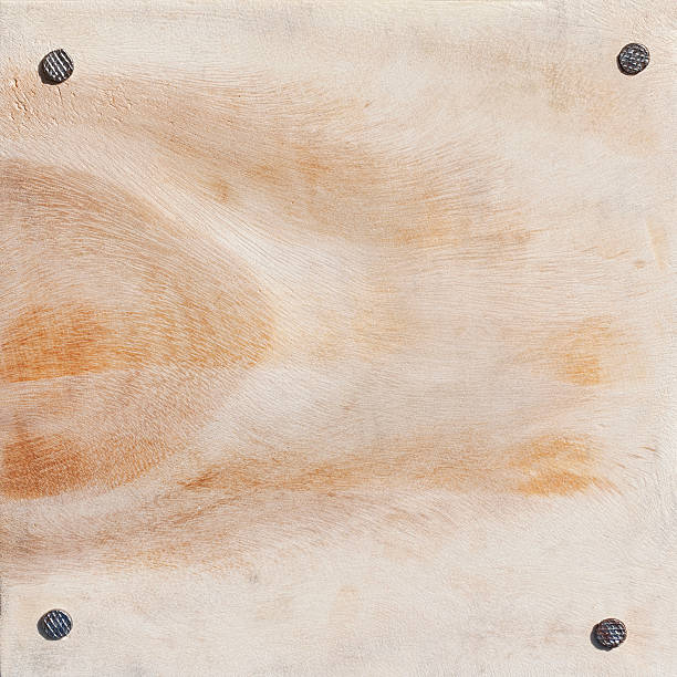 istock Wooden board with four nails. 185012133