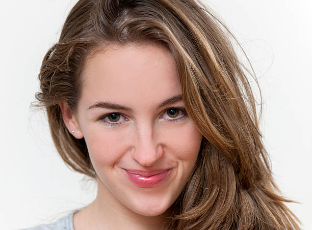 istock smirking attractive young woman 185012205