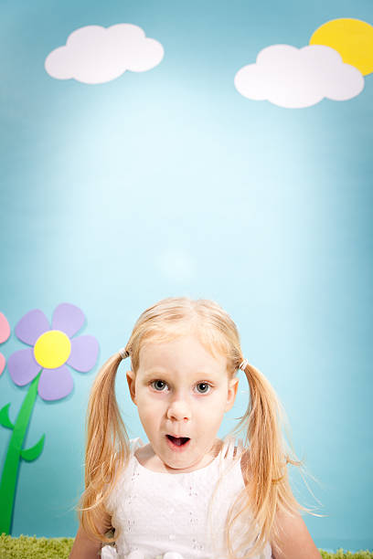 istock Little Girl Making Face, in Whimsical World, With Copy Space 185012233