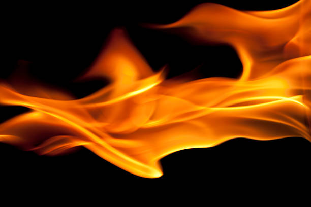 fire burning, flames on black background stock photo