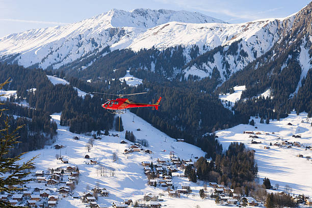 istock Helicopter hovers over the Swiss Alps 185012449