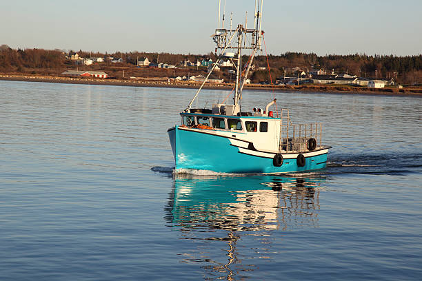 istock Fishing boat at sea 185012607
