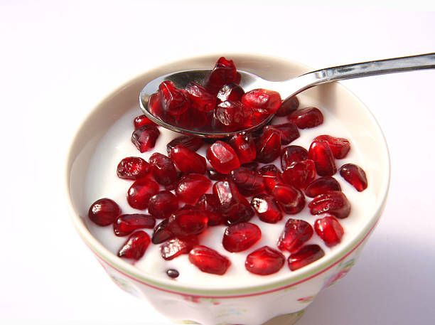 istock Organic yogurt with pomegranate berries. 185012789