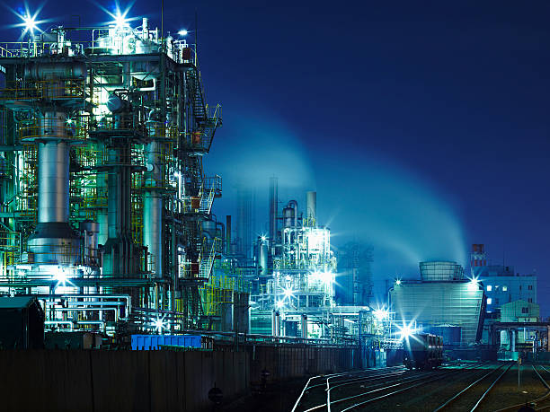 Chemical plant lights at night stock photo