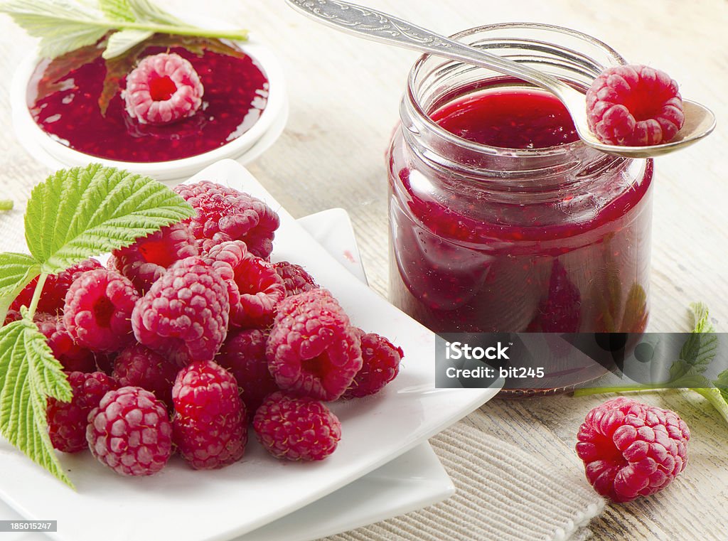 Fresh raspberries . Fresh raspberries and jam .Selective focus Close-up Stock Photo