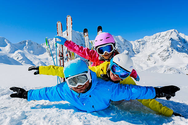 istock Family enjoying winter ski vacation 185016369