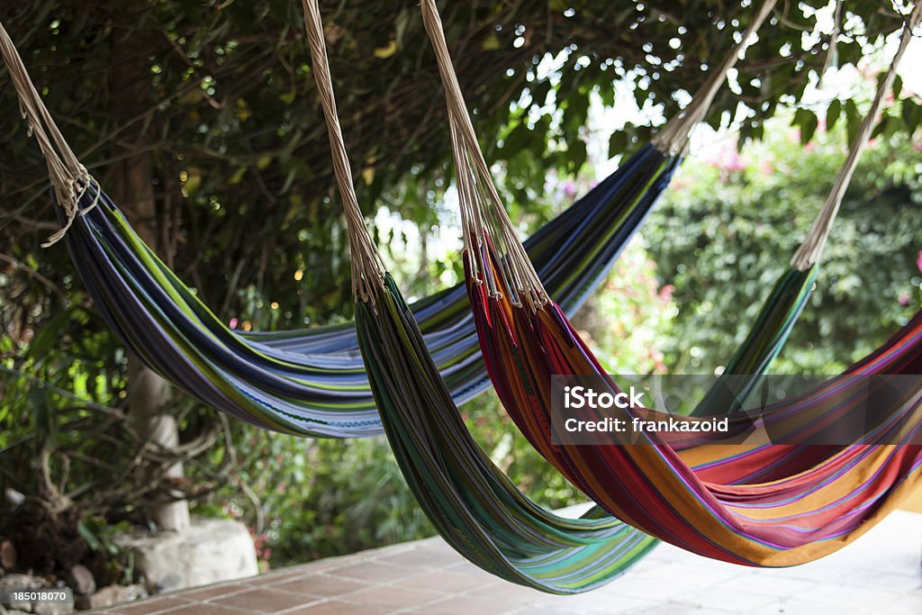 Lazy vacations in hammocks. Lazy vacations in hammocks. Relax outdoors. Coastline Stock Photo