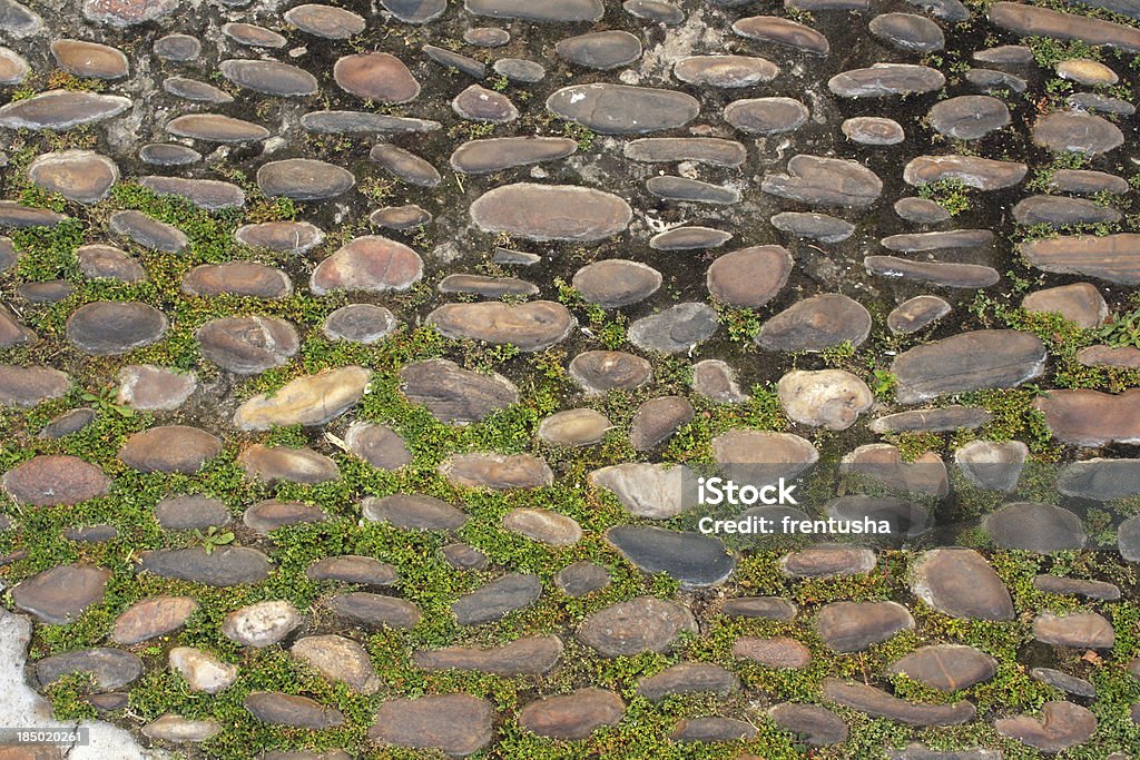 Ancient paving stone Texture of ancient paving stone Ancient Stock Photo