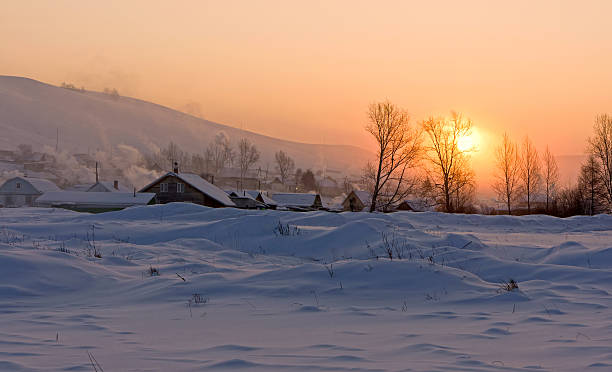 istock Sunrise in winter village 185020349