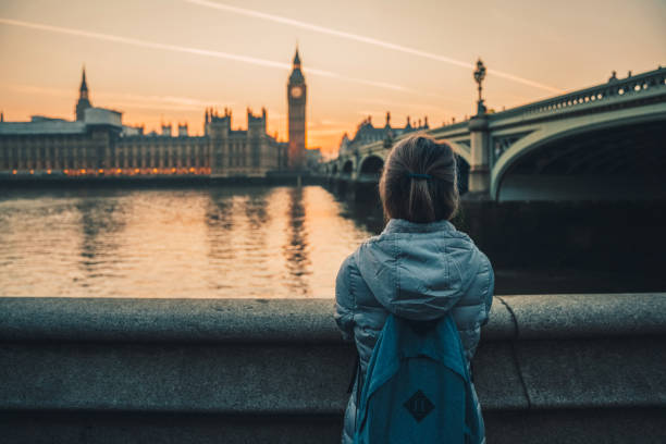 istock Solo traveller is watching sunset over London 1850211006