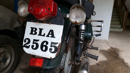 Mumbai, India, December 07 2021: Close up of vehicle registration number plate with BLA series on the backside of a two wheeler. BLA series was used in Bengal and Mumbai during 1940s