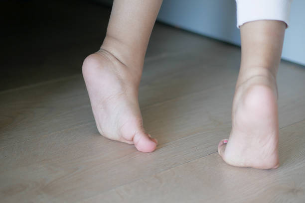 istock low angle view of A child walking on tiptoes 1850233637