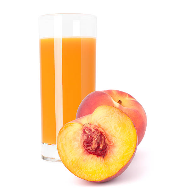 istock Peach fruit juice in glass 185023831