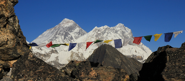 Prayer flags on Gokyo Peak and Mt Everest, Nepal.