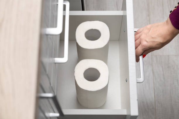 istock woman opening kitchen drawer with paper towel 1850244336