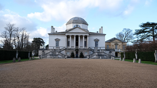 London, UK - 11.12.2023. Fragment of facade of Chiswick House and gardens - 18th century mansion in West London. Free access to the garden. Baroque style villa in Chiswick, London.