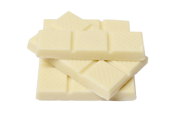 istock White chocolate pieces isolated on a white background. 1850255214