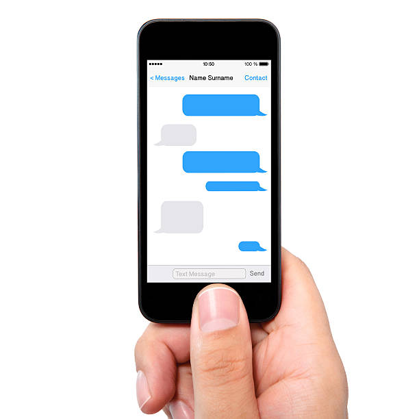 istock man hand holding the phone with sms chat a screen 185025539