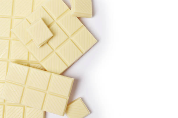 istock White chocolate pieces isolated on a white background. 1850256869