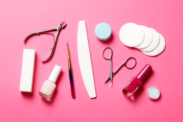 istock Flat lay a composition of tools for manicure and nail polish on a pink background. 1850278680