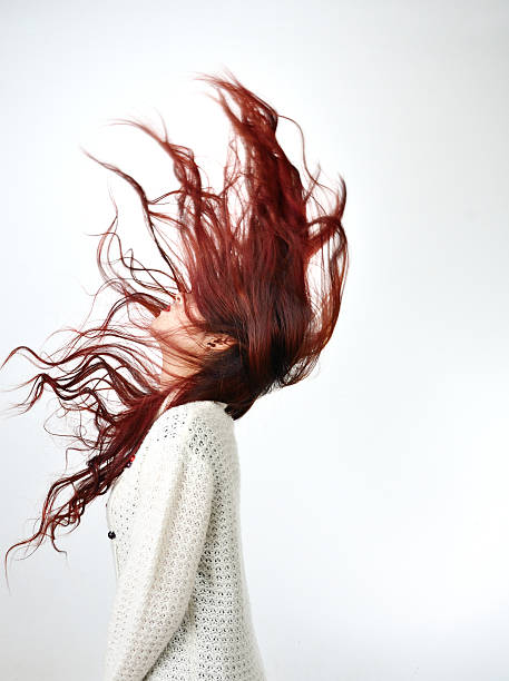 asian women red long hair in modern fashion stock photo