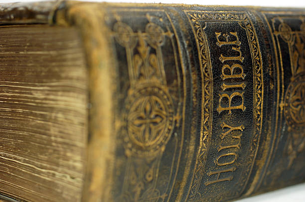 istock Spine of old ancient holy bible 185031478