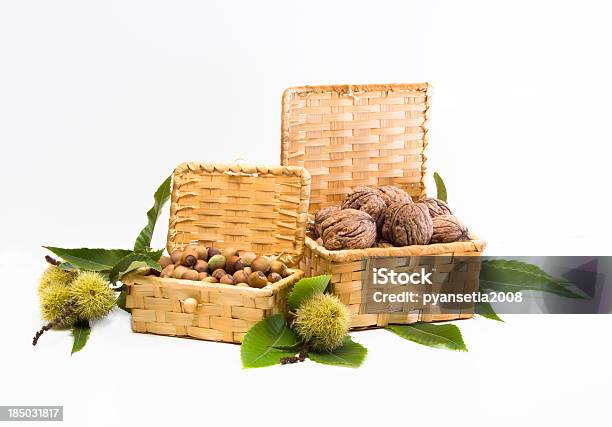 Walnuts And Hazelnuts In A Wicker Basket Stock Photo - Download Image Now - Autumn, Basket, Brown