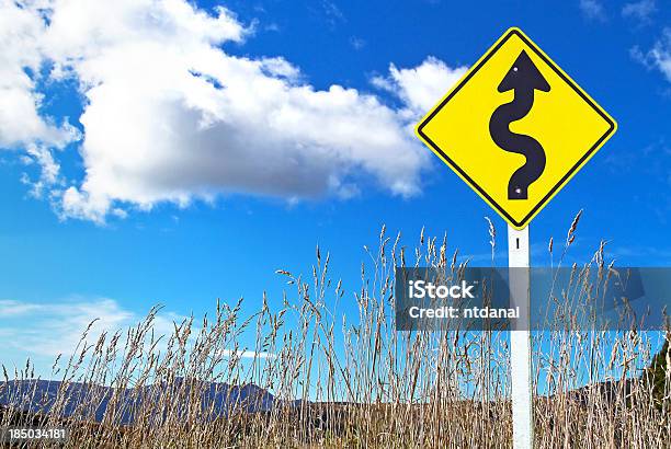 Traffic Sign Over Dry Grass Stock Photo - Download Image Now - Autumn, Black Color, Blue