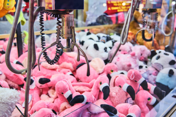 istock Joyful Fair Moment: Grasping Stuffed Toys with the Crane 1850345321
