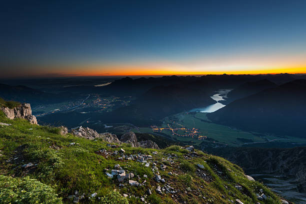 istock sunrise on the top of mountain with glowing sky 185034920