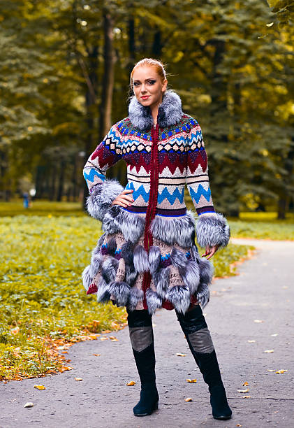 istock girl in a knitted coat 185037242