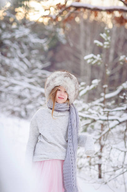 istock Happy child enjoys first snow. Close up and copy space 1850389062