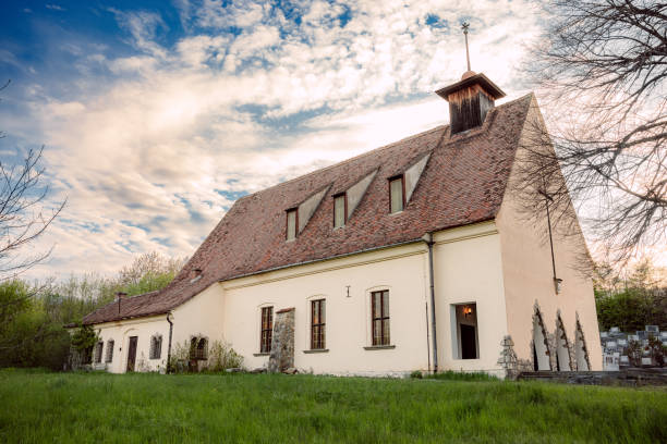istock a large white building with a clock tower sitting on the top 1850405683