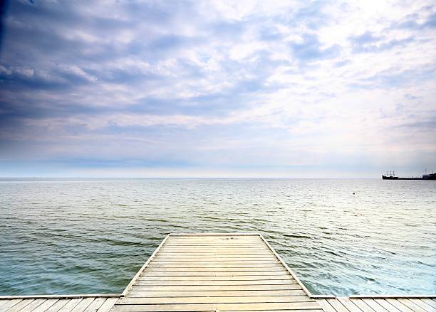 istock old wooden pier at the sea 185040925