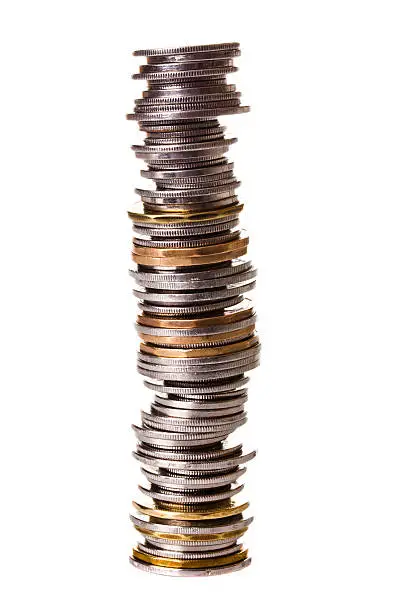Big pile of little coins isolated on white