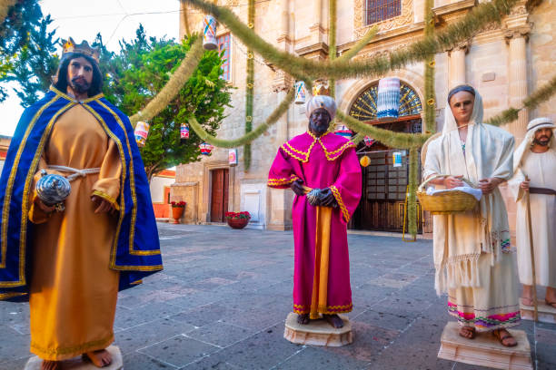 istock Birth of Jesus Christ in a manger with three wise men 1850435748