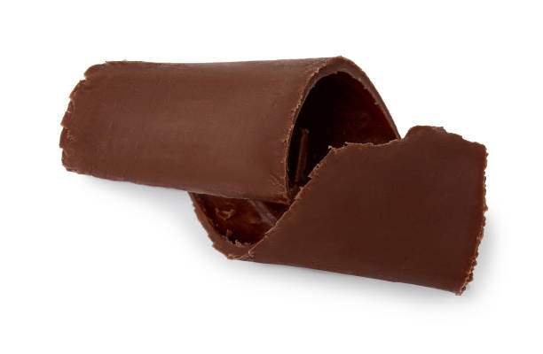 istock Tasty chocolate curl isolated on white, top view 1850436773