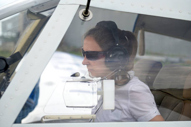 istock empowered woman in her plane 1850465261