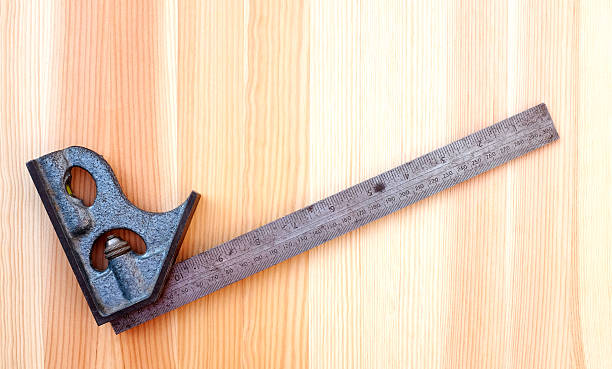 istock Metal set square on wood 185049510