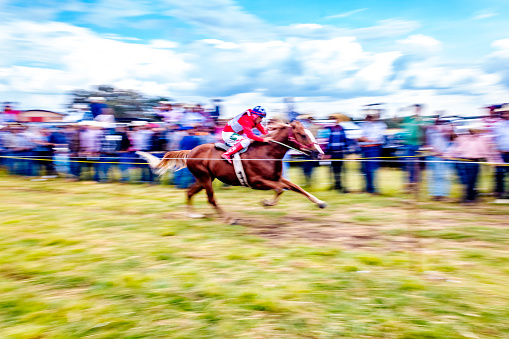 Laguna Grande, Zacatecas Mexico, September 29 2023 jockeys riding in a horse race during the patron saint festivities in the town of Laguna Grande in Monte Escobedo Zacatecas