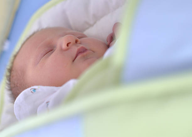istock Sweet newborn baby sleeping. 185050922
