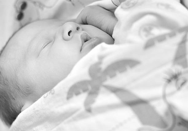 istock Sweet newborn baby sleeping. 185050934