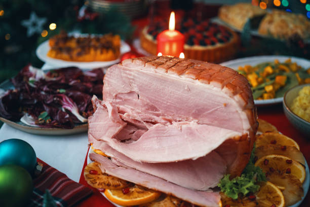 Christmas Dinner with Baked Glazed Ham and Various Vegetables